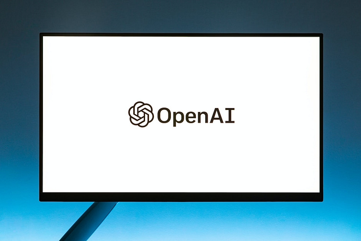 monitor screen with openai logo on white background
